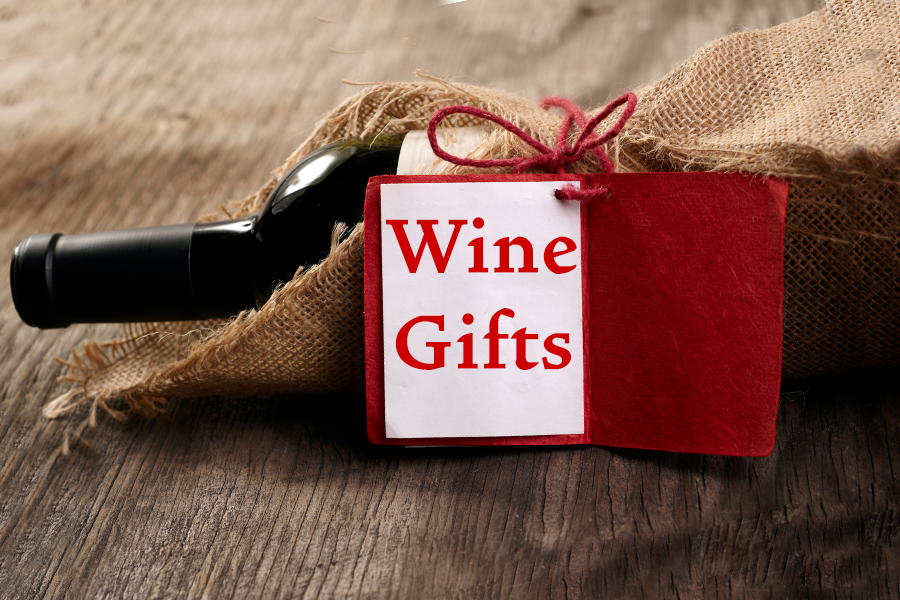 Wine Gifts - A wine bottle in a bag with a gift tag